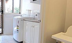 25--Family-washing-machine-and-dryer.--Clothes-line-outside